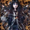 Elvira "Mistress of the Dark" is a captivating and controversial Skullector doll from Monster High