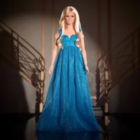The iconic elegance of Claudia Schiffer in Versace as Barbie!