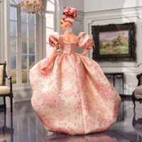 A Tribute to Fashion Barbie: a vision of elegance through time!